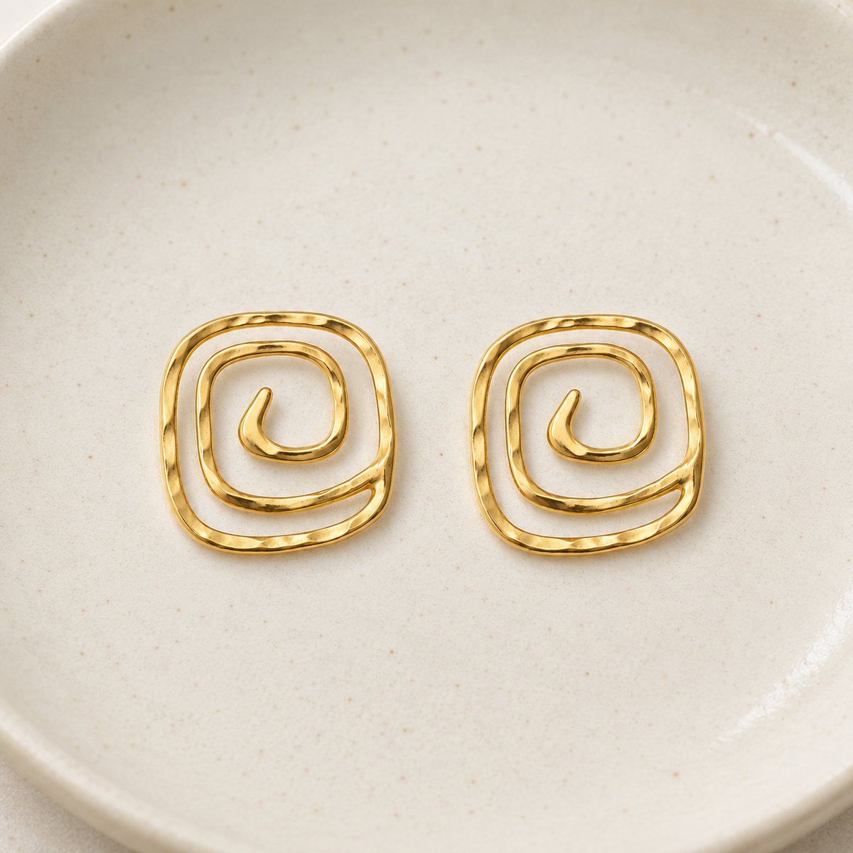 unwritten stud earrings